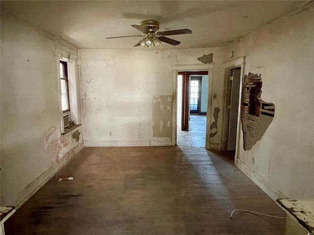 unfurnished room with ceiling fan