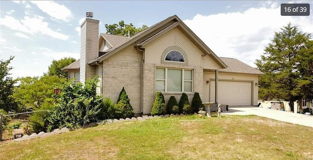 view of front facade featuring a garage and a front lawn