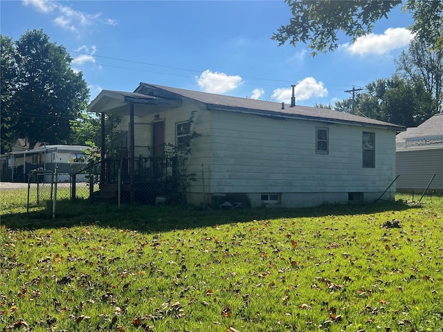 view of home's exterior featuring a lawn