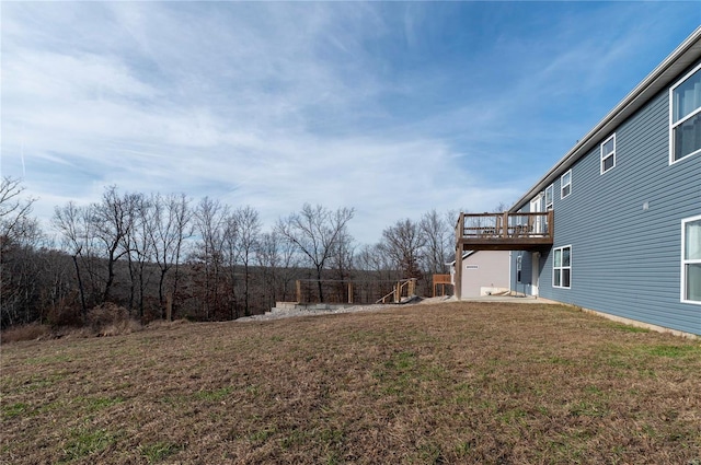 view of yard featuring a deck