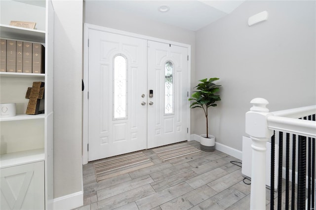 foyer with light wood-type flooring