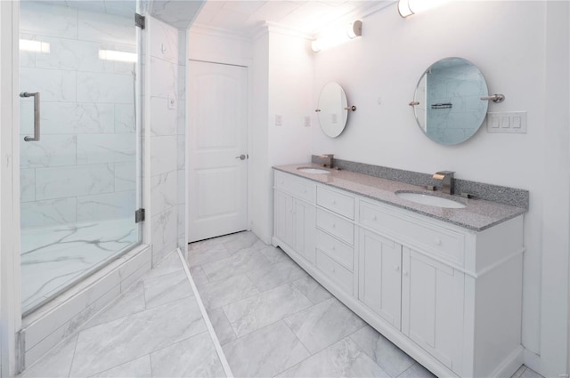 bathroom featuring vanity, ornamental molding, and walk in shower