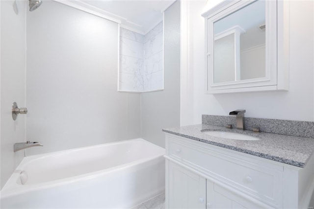 bathroom with vanity and washtub / shower combination