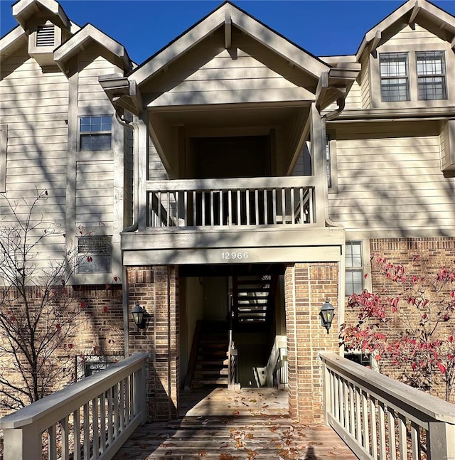 property entrance with a balcony