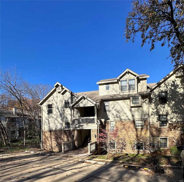 rear view of house with a balcony