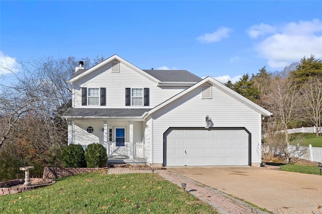 front facade with a front yard, a garage, and covered porch