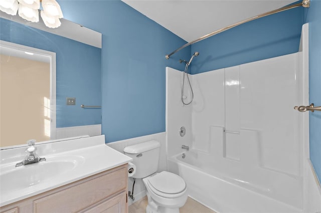 full bathroom featuring bathing tub / shower combination, tile patterned flooring, vanity, and toilet