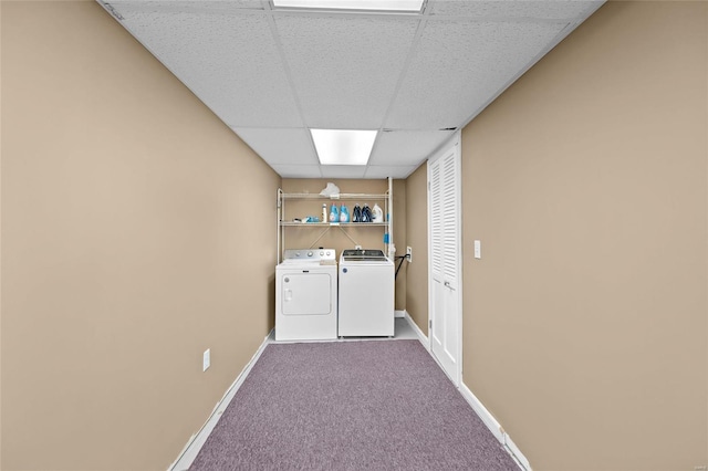 clothes washing area with carpet flooring and independent washer and dryer