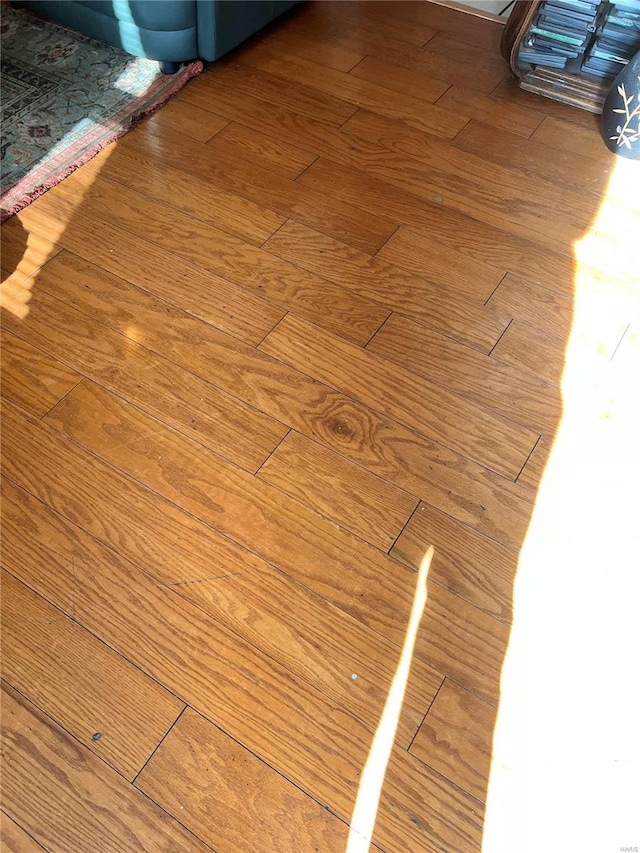 interior details featuring hardwood / wood-style flooring