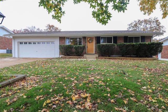 ranch-style house with a garage and a front yard