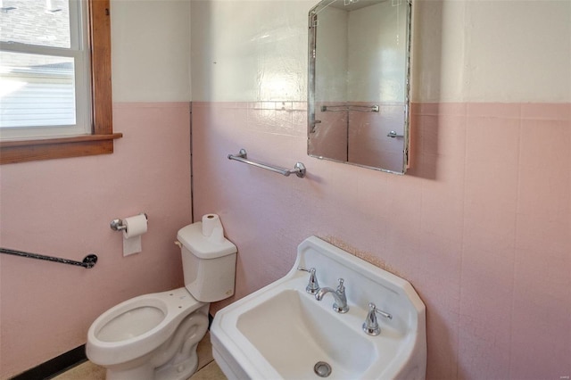 bathroom with sink and toilet