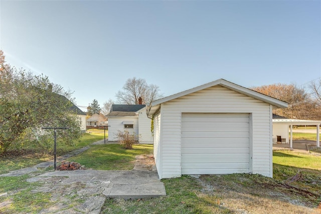 garage with a lawn