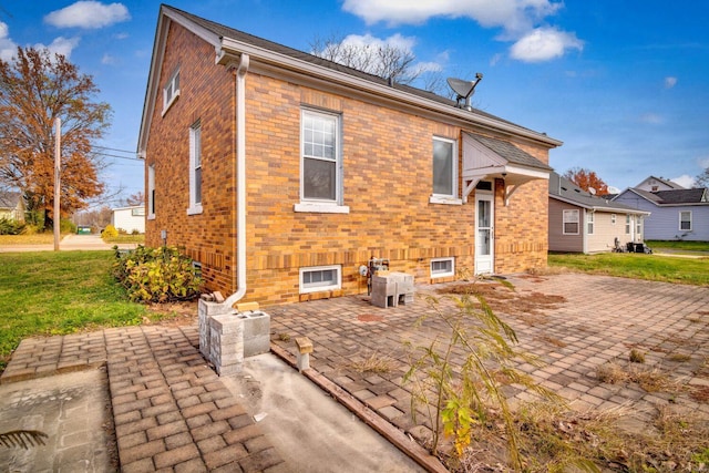 rear view of house featuring a patio area