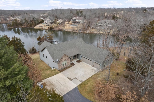 drone / aerial view featuring a water view