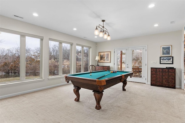 playroom featuring french doors, carpet flooring, visible vents, and baseboards