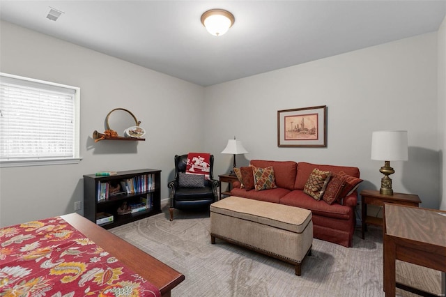 interior space featuring carpet and visible vents