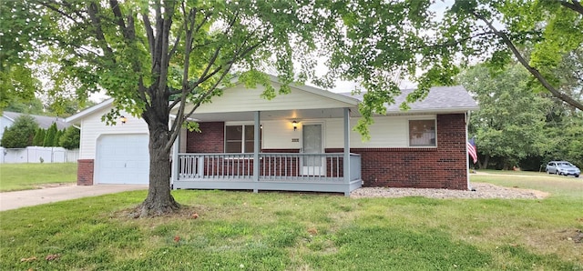 ranch-style home with a front yard, a porch, and a garage