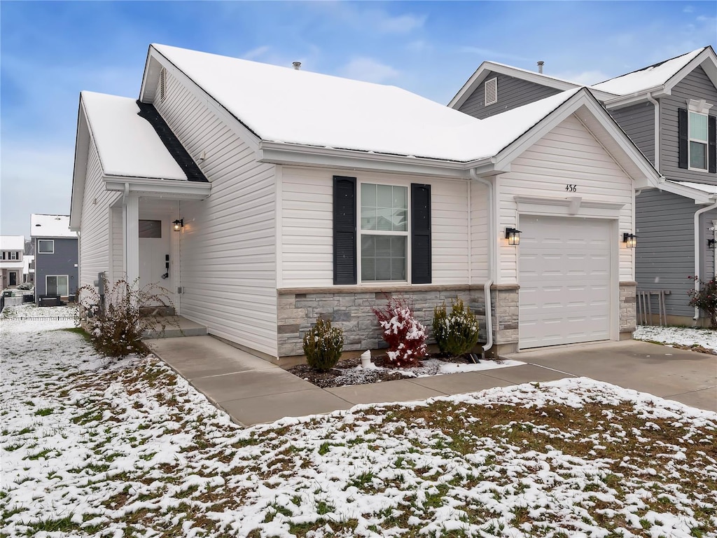 view of front of home with a garage