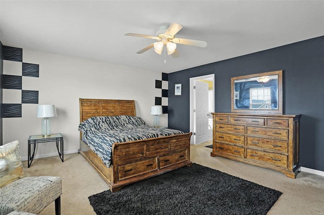 bedroom featuring light colored carpet and ceiling fan