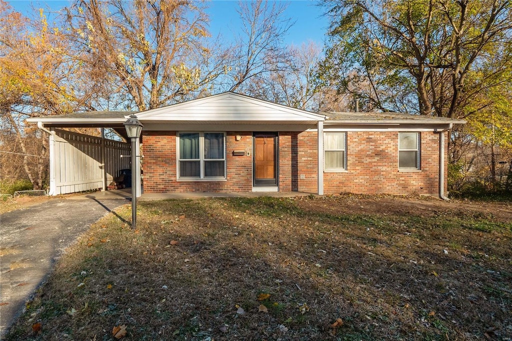 view of front of house with a carport