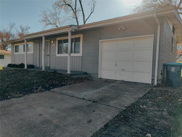 ranch-style home with a garage