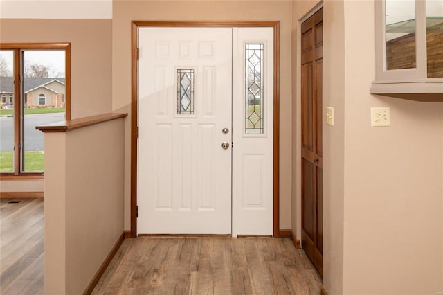 foyer with light hardwood / wood-style flooring