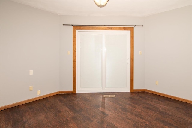 unfurnished bedroom with wood-type flooring