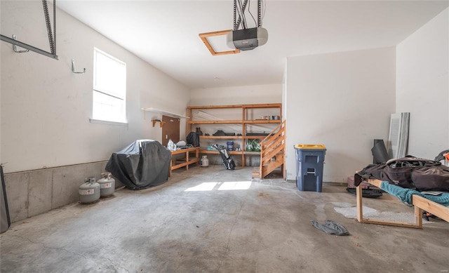 garage featuring a garage door opener