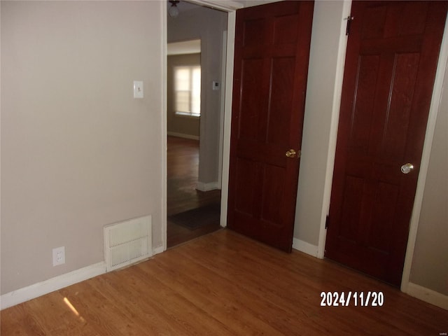 interior space with hardwood / wood-style flooring