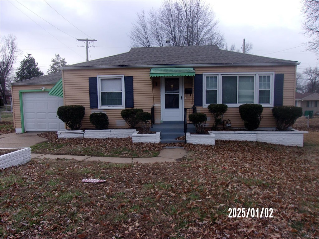 single story home with a garage