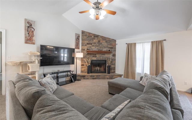 living room with ceiling fan, lofted ceiling, a fireplace, and carpet