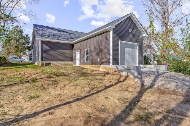 view of home's exterior featuring a garage