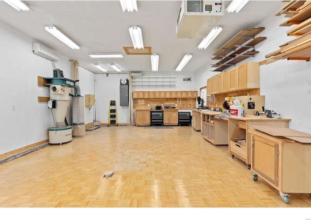 interior space with light brown cabinets, baseboards, light countertops, and a wall mounted AC