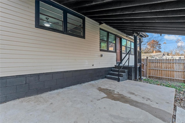 view of side of home featuring a patio area