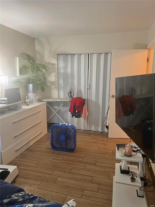 bedroom with wood-type flooring