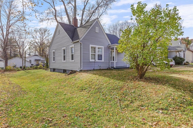 view of front of home featuring a front yard