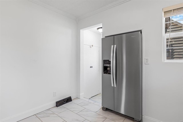 kitchen featuring stainless steel fridge with ice dispenser and ornamental molding