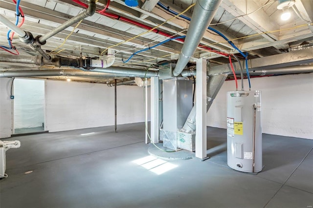 basement featuring heating unit and water heater