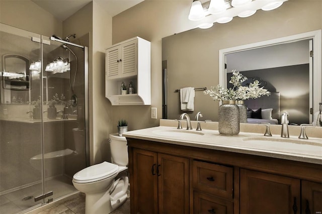 bathroom with walk in shower, tile patterned flooring, vanity, and toilet