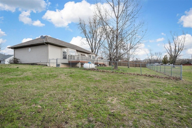 view of yard featuring a wooden deck