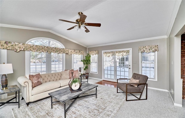 living room with ceiling fan, a textured ceiling, crown molding, and vaulted ceiling