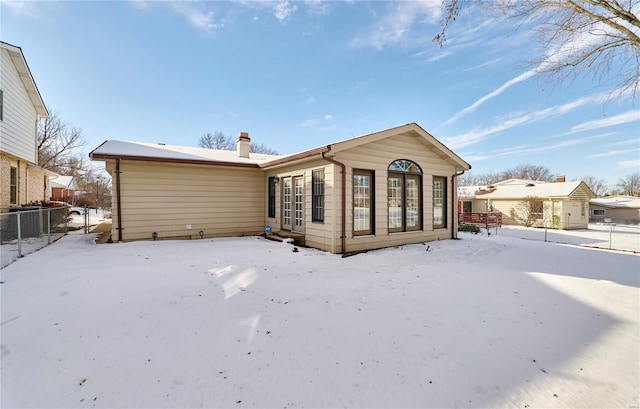 view of snow covered property