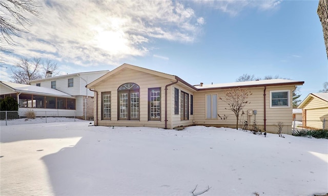 view of snow covered property