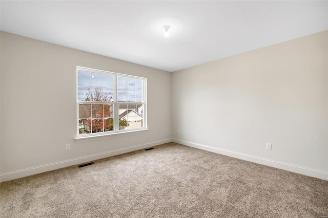 view of carpeted spare room