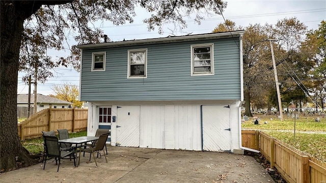 back of property featuring a patio