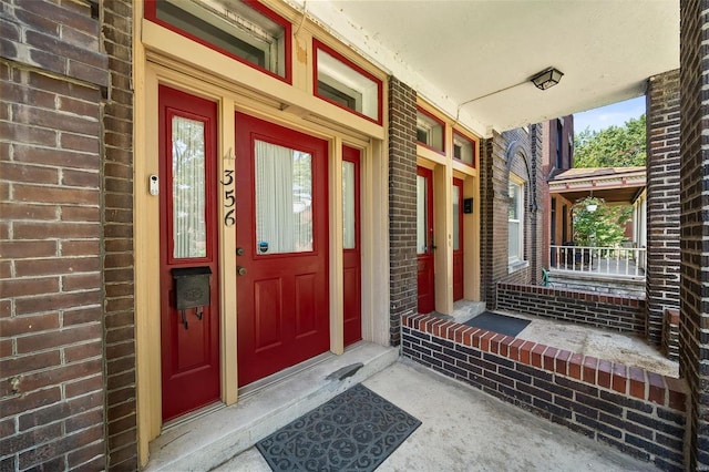 property entrance featuring covered porch