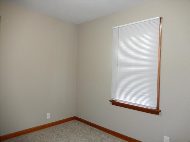 view of carpeted spare room