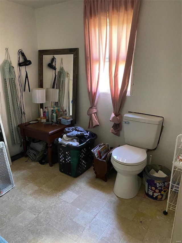 bathroom featuring toilet