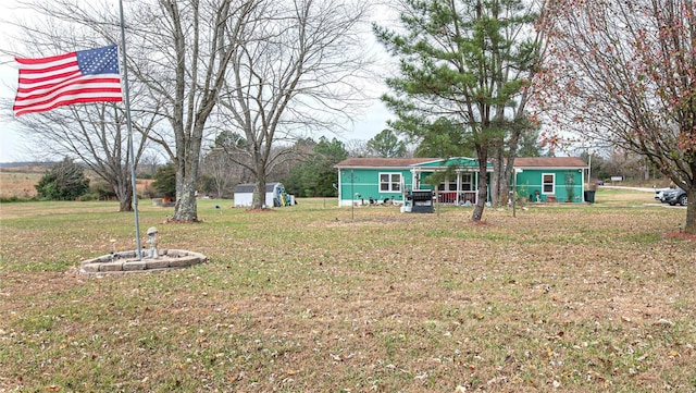 view of yard with a shed