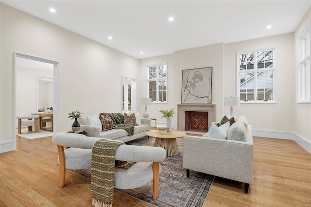 living room with light hardwood / wood-style floors